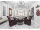 Luxurious bedroom featuring a large bed and plush armchairs at 7514 N 22Nd Pl, Phoenix, AZ 85020