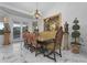 Formal dining area with antique furniture and a chandelier at 7514 N 22Nd Pl, Phoenix, AZ 85020