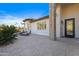 Front exterior showcasing a brick paved patio, ornate door, and stone accents at 7514 N 22Nd Pl, Phoenix, AZ 85020