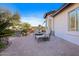 Relaxing backyard patio with brick paving, fire pit, and comfortable seating at 7514 N 22Nd Pl, Phoenix, AZ 85020