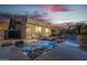 Stunning pool and spa area with a spiral staircase and mountain views at 7514 N 22Nd Pl, Phoenix, AZ 85020