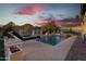 Inviting pool and spa with lounge chairs and mountain backdrop at 7514 N 22Nd Pl, Phoenix, AZ 85020
