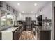 Modern kitchen with stainless steel appliances and granite countertops at 939 W Mission Ln, Phoenix, AZ 85021