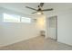 Bright bedroom with large closet and ceiling fan at 1017 W Whitton Ave, Phoenix, AZ 85013