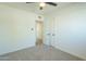 Spacious bedroom with carpet and ceiling fan at 1017 W Whitton Ave, Phoenix, AZ 85013