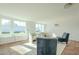 Bright living room with tiled floors and large windows at 1017 W Whitton Ave, Phoenix, AZ 85013