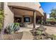 Spacious backyard patio with seating area and desert landscaping at 11209 E Cavedale Dr, Scottsdale, AZ 85262