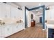 White kitchen cabinets and view into entryway at 1310 E Beechnut Pl, Chandler, AZ 85249