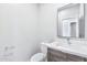 Modern bathroom with floating vanity and a large mirror at 1421 E Weldon Ave, Phoenix, AZ 85014