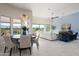 Dining area with round table, chairs, and view to the backyard at 17763 E Stocking Trl, Rio Verde, AZ 85263