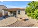 Charming backyard with covered patio, fire pit, and grill at 2008 E Stacey Rd, Gilbert, AZ 85298