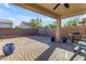 Covered patio, with brick flooring and grill at 2008 E Stacey Rd, Gilbert, AZ 85298