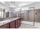Double vanity bathroom with large walk-in shower at 2008 E Stacey Rd, Gilbert, AZ 85298