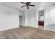 Bedroom with ceiling fan and plush carpeting at 2008 E Stacey Rd, Gilbert, AZ 85298