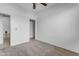 Spacious bedroom with neutral carpet and door to hallway at 2008 E Stacey Rd, Gilbert, AZ 85298