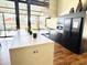Modern clubhouse kitchen featuring stainless steel appliances and ample counter space at 2008 E Stacey Rd, Gilbert, AZ 85298