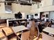 Spacious clubhouse kitchen with plenty of seating, appliances, and vending machines at 2008 E Stacey Rd, Gilbert, AZ 85298