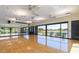 Well-equipped fitness center with large mirrors, wood floors, and natural light at 2008 E Stacey Rd, Gilbert, AZ 85298