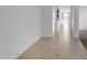 Bright hallway with tile flooring leading to other rooms at 2008 E Stacey Rd, Gilbert, AZ 85298