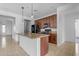 Modern kitchen with granite countertops and stainless steel appliances at 2008 E Stacey Rd, Gilbert, AZ 85298