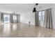 Bright living room with tile floors and sliding glass doors at 2008 E Stacey Rd, Gilbert, AZ 85298