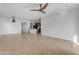 Spacious living room with tile floors and ceiling fan at 2008 E Stacey Rd, Gilbert, AZ 85298