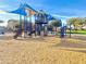 Large playground with climbing structures, slides, and swings at 2008 E Stacey Rd, Gilbert, AZ 85298