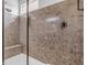 Modern shower with built-in seat and stone wall at 2008 E Stacey Rd, Gilbert, AZ 85298