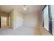 Spacious bedroom with large window and carpeted floors at 20856 E Arroyo Verde Dr, Queen Creek, AZ 85142