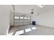 Spacious garage with automatic door opener and ample storage space at 20856 E Arroyo Verde Dr, Queen Creek, AZ 85142