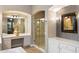 Modern bathroom boasts a glass shower, vanity area, and stylish decor at 2317 W Horsetail Trl, Phoenix, AZ 85085