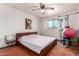 Spacious bedroom with a large bed and home gym at 2325 W Orchid Ln, Phoenix, AZ 85021