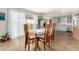 Kitchen with granite countertops and wooden table at 2325 W Orchid Ln, Phoenix, AZ 85021