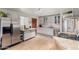 Modern kitchen with stainless steel appliances and granite island at 2325 W Orchid Ln, Phoenix, AZ 85021