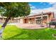 Wonderful backyard patio with seating and grill at 2325 W Orchid Ln, Phoenix, AZ 85021