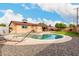Expansive backyard with a kidney shaped pool at 2325 W Orchid Ln, Phoenix, AZ 85021