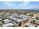 Aerial view of community, pool, and surrounding area at 240 S Old Litchfield Rd # 107, Litchfield Park, AZ 85340