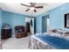 Comfortable bedroom with ceiling fan and closet at 3020 E Des Moines St, Mesa, AZ 85213