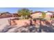 Cute single story home with a large front yard and driveway at 3020 E Des Moines St, Mesa, AZ 85213