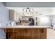 Kitchen boasts a breakfast bar and modern appliances at 3020 E Des Moines St, Mesa, AZ 85213