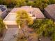 Aerial view of a single-story home with a flat roof and desert landscaping at 32427 N 71St Way, Scottsdale, AZ 85266