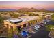 Aerial view of a shopping center featuring restaurants and parking at 32427 N 71St Way, Scottsdale, AZ 85266