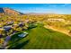 Aerial view of golf course and surrounding area at 32427 N 71St Way, Scottsdale, AZ 85266