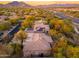 Aerial view of house with solar panels and desert landscape at 32427 N 71St Way, Scottsdale, AZ 85266
