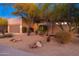 Landscaped front yard with drought-tolerant plants and a desert aesthetic at 32427 N 71St Way, Scottsdale, AZ 85266