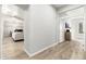 View of a bright hallway with light wood floors at 32427 N 71St Way, Scottsdale, AZ 85266