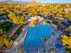 Community pool with hot tub, lounge chairs, and mountain views at 32427 N 71St Way, Scottsdale, AZ 85266