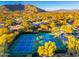 Two well-maintained tennis courts at 32427 N 71St Way, Scottsdale, AZ 85266