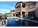 Backyard with pool, patio, and stone accents on exterior at 3722 N Sonoran Hls, Mesa, AZ 85207