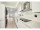 Modern kitchen featuring stainless steel appliances and white cabinets at 5138 E Holly St, Phoenix, AZ 85008